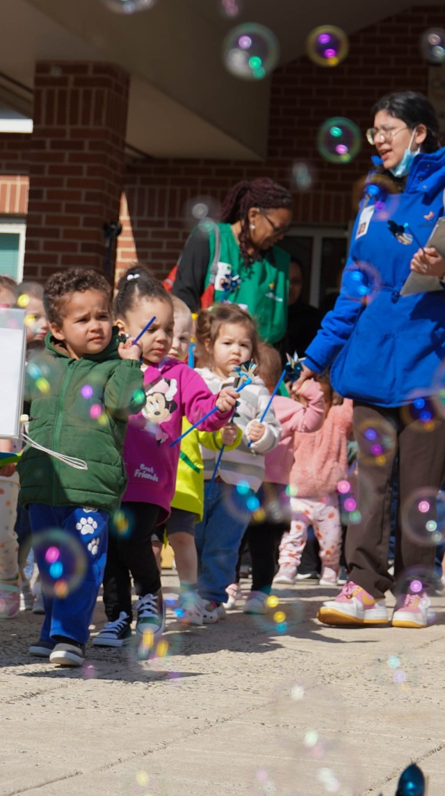 Children line up to begin the Pinwheel Ceremony around the Cody Child Development Center Apr. 1 to kick off Month of the Military Child.