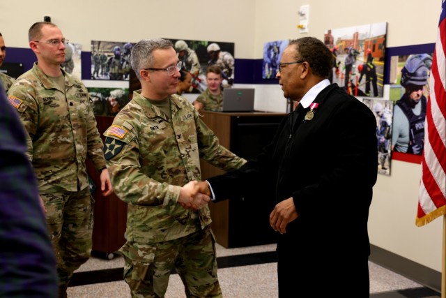 Col. Scott J. Smith (left) and Charles Hughes (right)