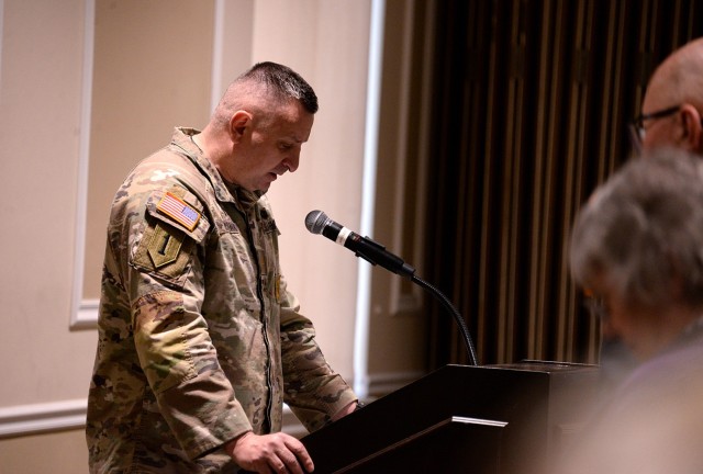 Chaplain (Maj.) Arek Ochalek, religious support integrator, Combined Arms Doctrine Directorate chaplain, delivers the invocation at the beginning of the Fort Leavenworth National Prayer Luncheon April 3, 2025, at the Frontier Conference Center at...
