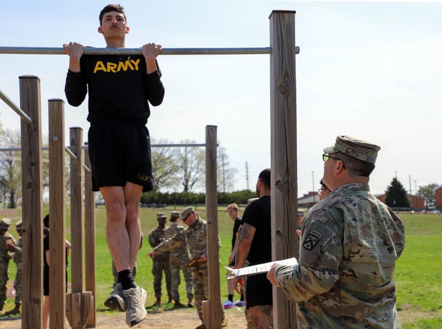 Cadet Harvey Peavler, University of Central Missouri ROTC, performs the flexed-arm hang exercise during the German Armed Forces Proficiency Badge fitness test March 31, 2025, at Normandy Field at Fort Leavenworth, Kansas. To qualify, participants...