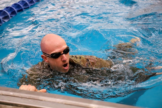 Maj. Weston Thomsen, Command and General Staff College student, swims his final lap of the German Armed Forces Proficiency Badge swim test March 31, 2025, at Harney Sports Complex at Fort Leavenworth, Kansas. GAFPB participants swim 100 meters in...