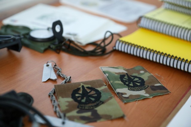 Various training aids sit on the table for Polish soldiers to see during a class taught by U.S. Army master gunners as part of the Abrams Operations Summit at Bucierz Range, Drawsko Pomorskie, Poland, April 27, 2022. This class was for Polish...