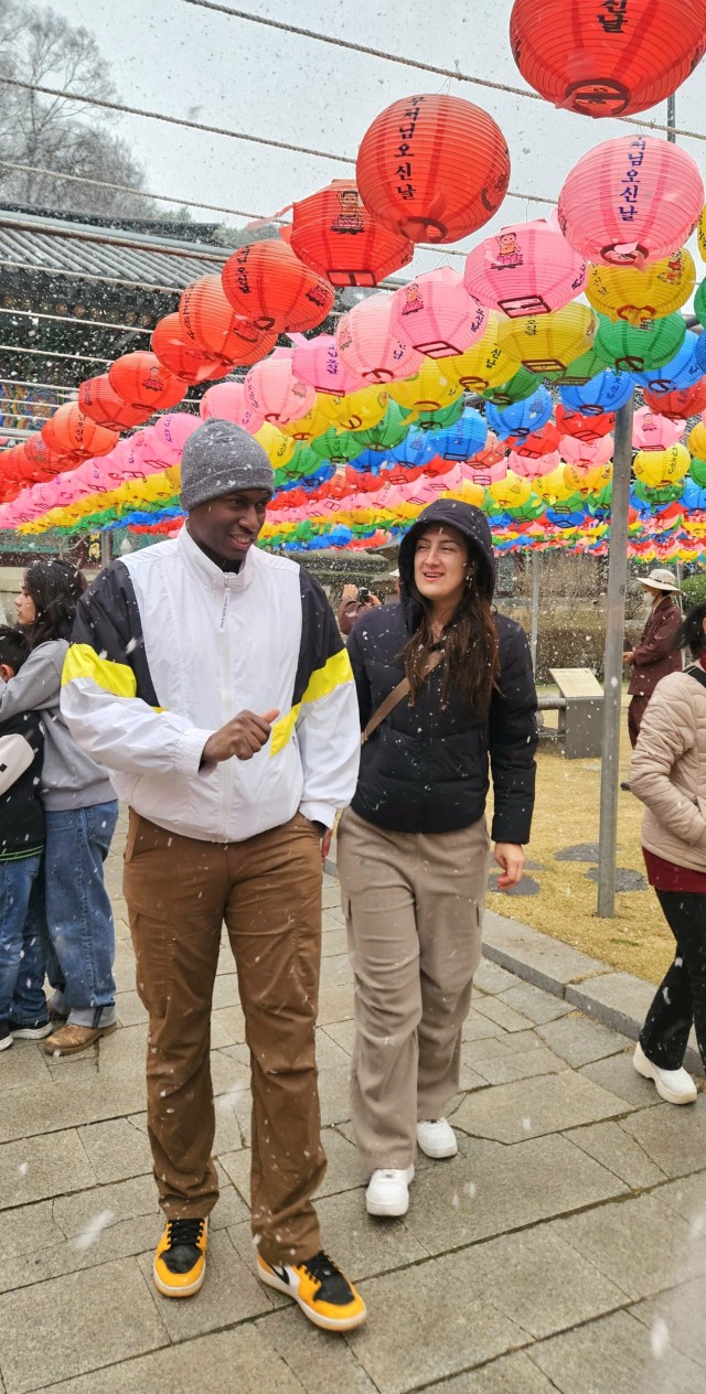 Community members from Camp Humphreys walk the grounds of Gwangdeoksa Temple as part of a cultural tour, March 29, 2025. ...
