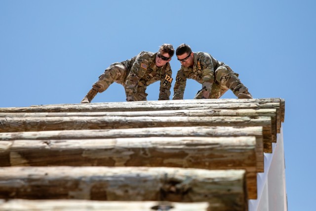 Soldiers compete in an obstacle course during the Gen. Omar N. Bradley Best Observer, Coach/Trainer Competition