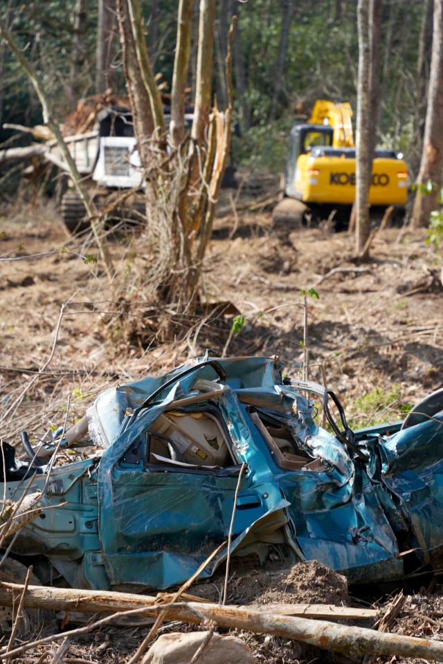 Contractors supporting the U.S. Army Corps of Engineers remove vegetative and manmade debris—including tires and other obstructions—from Bear Creek in Mitchell County, North Carolina, April 8, 2025. The debris removal effort is part of the...