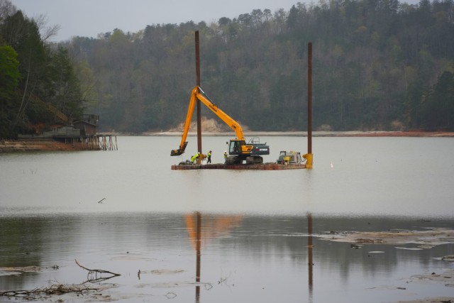 Contractors supporting the U.S. Army Corps of Engineers remove sediment from Lake Lure and the Broad River to restore navigability in support of Hurricane Helene recovery operations in Western North Carolina, April 2, 2025. Using heavy equipment...