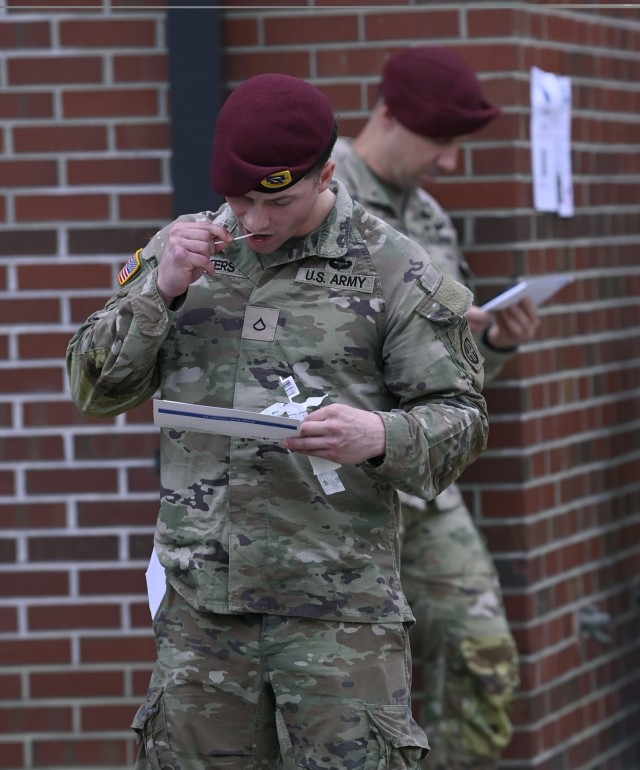 A Soldier from the 82nd Airborne Division, swabs his cheek, during a bone marrow screening, facilitated by members of the Joint Special Operations Medical Training Center, under the U.S. Army John F. Kennedy Special Warfare Center and School, at...