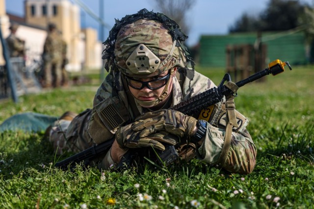 Soldiers execute patrol lanes during Best Squad competition in Italy