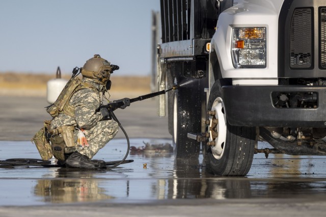 U.S. Army Soldier from 4th Battalion, 5th Special Forces Group (Airborne), decontaminates a truck at Dugway Proving Grounds, Utah, on Nov. 14, 2024. The exercise is a bi-annual event that evaluates the CRD’s technical and tactical skillsets to...