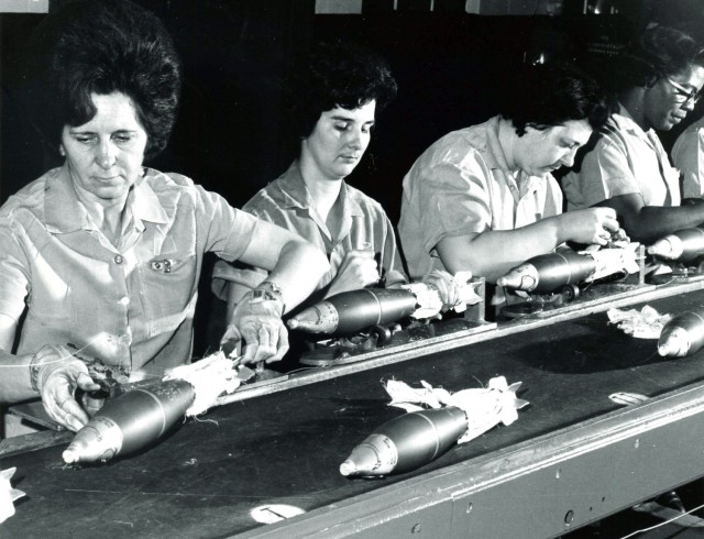 Employees at the Milan Army Ammunition Plant inspect 81mm mortar rounds produced at the plant in this photo from the 1960s.