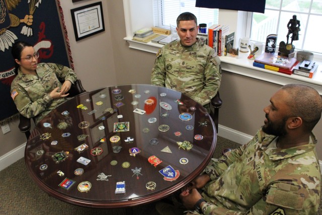 PICATINNY ARSENAL, N.J. - (From left) - Sgt. Tisha Rivera, Command Sgt. Maj. David M. Franks, and Sgt. 1st Class Randy McKire Jr.
