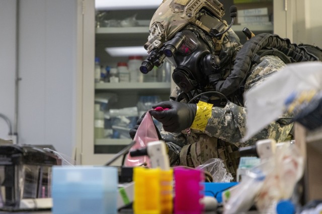 U.S. Army Soldiers from 4th Battalion, 5th Special Forces Group (Airborne), secures a sample of a biological warfare agent during their external evaluation at Dugway Proving Grounds, Utah, on Nov. 12, 2024. The exercise is a bi-annual event that...