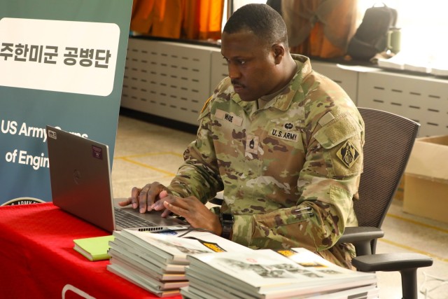 Contracting specialist preparing for event.