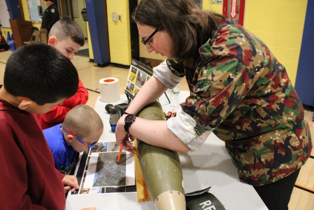 ROCKAWAY, N.J. - Samuel Denzer, a general engineer assigned to the U.S. Army Combat Capabilities Development Command Armaments Center, uses a map as a visual aid to explain how artillery acts to support troops.