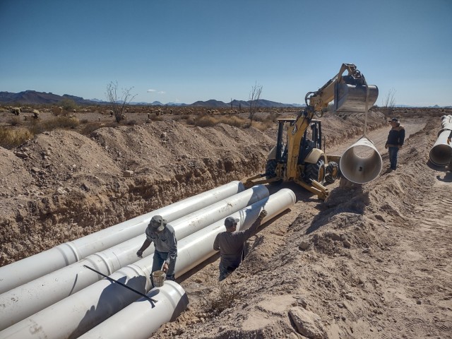 The Red Raven Tank is filled by water runoff from the desert’s rare rain events, situated with care near washes that will run with as little as one quarter of an inch of rain. The officials chose secondary or tertiary washes, not large ones that...