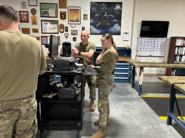 SSG Rubino, SGT Kucal, and PFC Coffey from the 56th QM Rigger Support Team located at Camp Fogarty, RI utilizing MAT-APM for daily rigging operations.