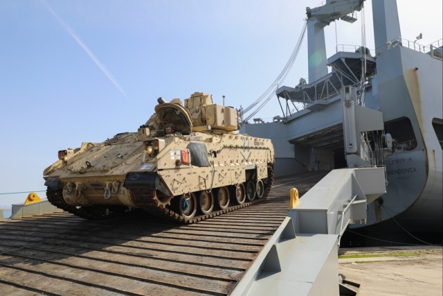 Port of Alexandroupolis Makes Sustainment History with Heavy Brigade Movement, A M2 Bradley Infantry Fighting Vehicle from the 3rd Armored Brigade Combat Team, 4th Infantry Division rolls off the cargo vessel Leroy A. Mendonca at the Port of...