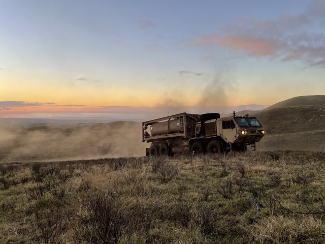 An LHS moves in Pohakukoa Training Area as the company establishes a FTCP in favorable terrain while supporting the OPFOR Battalion for JPMRC 24, Nov. 3, 2023.