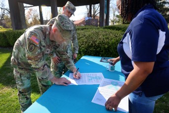 Fort Knox community gathers for sexual assault awareness month ribbon lighting, proclamation signing