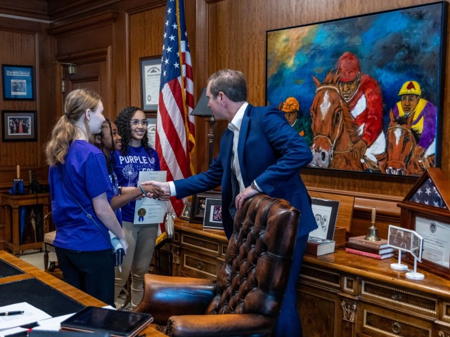 Fort Knox Youth of the Year Arianna Leon; Junior Youth of the Year Hailey Bagley and School Age Center Emerging Youth of the Year Charlie Pegues meet Governor Andy Beshear following a Team Kentucky update at the State Capitol Rotunda in Frankfort,...