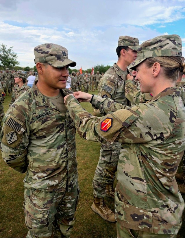 Capt. Gabriel E. Sanchez (left)