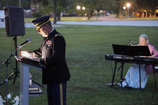 Chaplain (Maj.) David Chapman, leads the group in the scripture reading. He read from the passage that describes Mary Magdelene, Peter and John’s experiences on the first Easter Sunday.