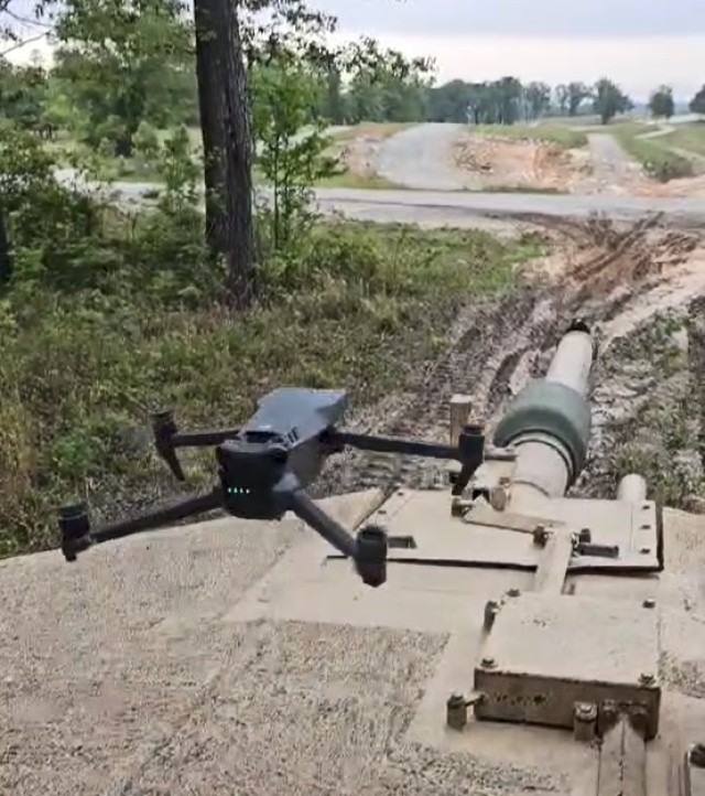 SFC Dustin West, instructor for the ABOLC "Ten Day War", operates a sUAS from the turret of a M1A2 SEP Main Battle Tank while in support of ABOLC Class 24-001.