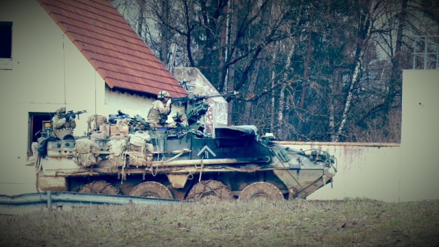 Stryker suppresses an urban objective.