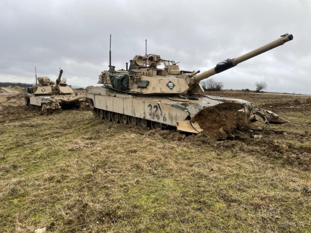 M1A2 Tank using the mine plow during an exercise.