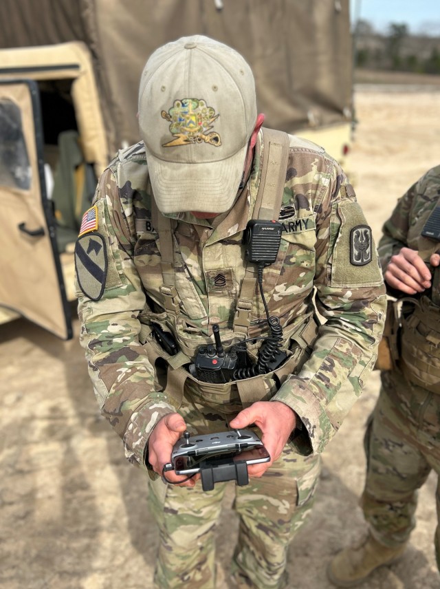 SFC Christopher Bane, instructor for the ABOLC "Ten Day War", operates a sUAS dismounted while in support of ABOLC Class 24-001
