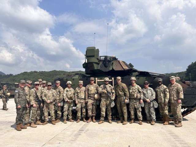 Members of the Republic of Korea Army (ROKA); U.S. Forces Korea (USFK); 2nd Infantry Division; 2nd Stryker Brigade, 4th Infantry Division; and 1-77 Armor pose for a celebratory photo following the completion of Warrior Fortitude 23 at Rodriguez...