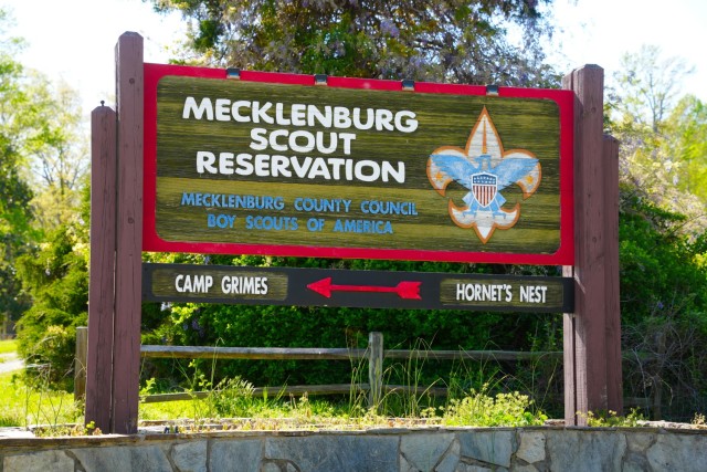 A sign welcomes visitors to Camp Grimes in McDowell County, North Carolina, April 18, 2025. The 1,100-acre Boy Scout camp is undergoing debris removal as part of a FEMA-assigned mission led by the U.S. Army Corps of Engineers following Hurricane...