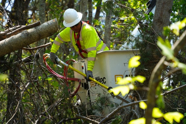 Contractors working under the direction of the U.S. Army Corps of Engineers clear storm debris from Hurricane Helene at the Boy Scouts of America's Camp Grimes in McDowell County, North Carolina, April 18, 2025. The removal effort is part of a...