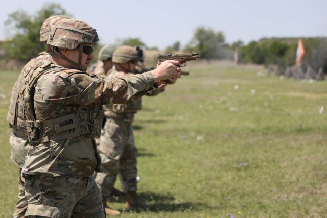 U.S. Army Spc. Zachary Proctor, assigned to the 86th Expeditionary Signal Battalion, 11th Signal Brigade, participates in the M17 qualification range during a German Armed Forces Proficiency Badge testing on Fort Cavazos, TX, 15 April, 2025. The...