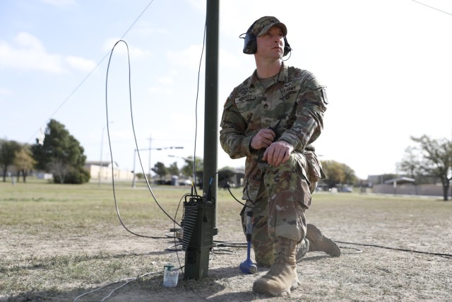 U.S. Army Staff Sgt. Jaron Hohertz, assigned to 11th Signal Brigade, Headquarters and Headquarters Battalion conducts voiceover during the QRPX (low-power, high-frequency communications exercise/competition) March 22, 2025, on Fort Cavazos, Texas....