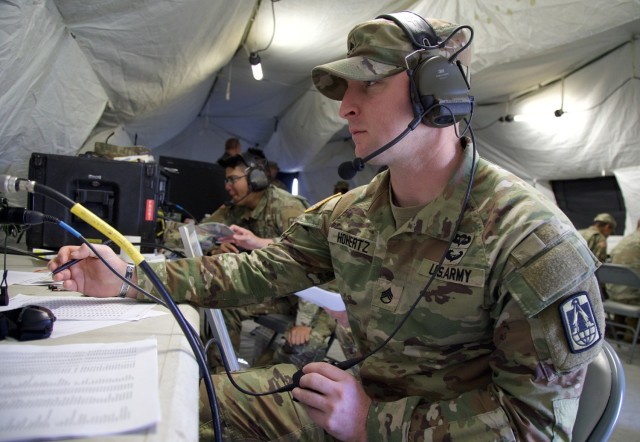 Staff Sgt. Jaron Hohertz, a Brigade Senior Satellite Communications Manager with 11th Corps Signal Brigade, attempts to create a channel for communication during the QRPX (low-power, high-frequency communications exercise/competition) March 20,...