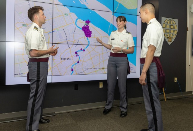 Cadets Matalyn Espenshade, Ocean Mao and George Lewis are working on a case study of GNSS interference patterns in INDOPACOM for their Projects Day capstone project on April 17 in Washington Hall....