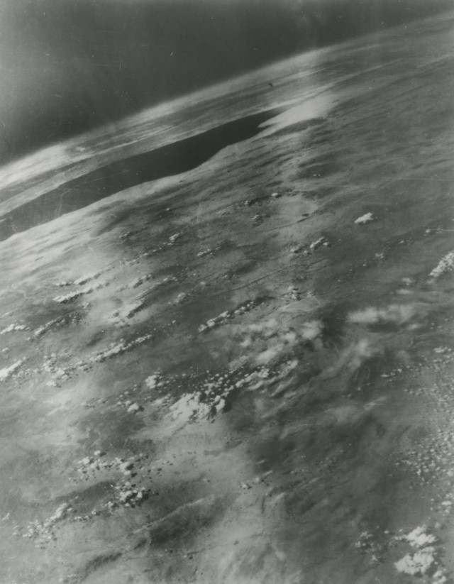 Photographs taken from V-2 No. 21, which launched on 10 May 1947, 227 seconds after takeoff and at an altitude of 101 miles, were used to create a composite image showing the curvature of the Earth. The black spot in the upper left is the Gulf of...