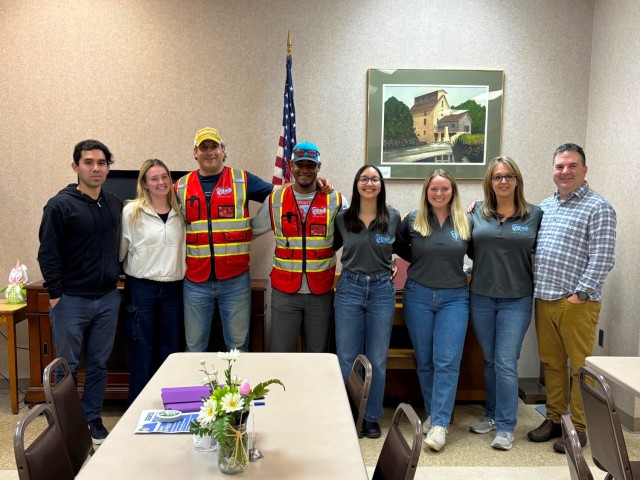 Terri McClure, program manager for private property debris removal intake and oversight in McDowell County, North Carolina (second from right), poses for a photos with her team at a PPDR application fair held in Old Fort, N.C. on April 3, 2025....