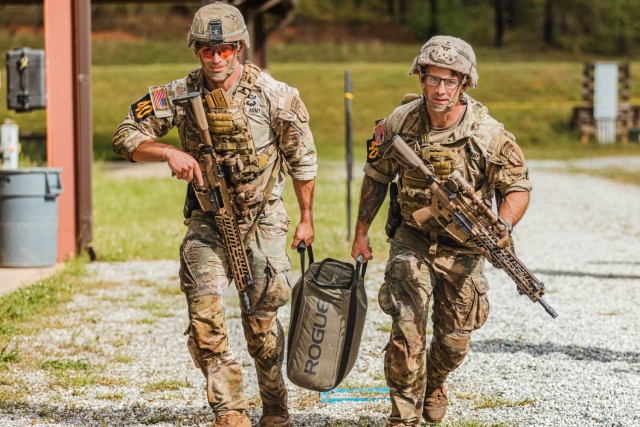 Capt. Austin Rutledge and Sgt. 1st Class Nicholas Whitney, Soldiers assigned to the Airborne and Ranger Training Brigade, compete in the 2025 Best Ranger Competition during the “Weapons” event, April 11, 2025 at Krilling Range, on Fort...