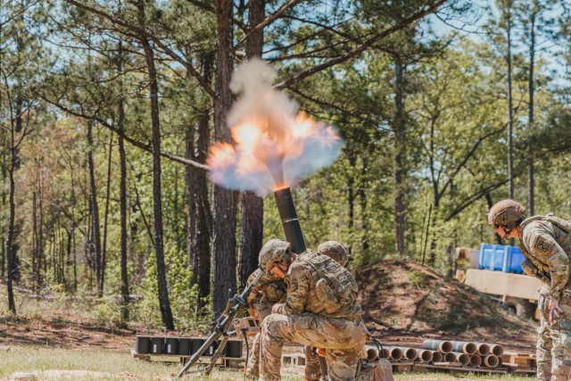 U.S. Army Soldiers assigned to 3rd U.S. Infantry Regiment (The Old Guard) aim and fire a 120mm M120A1 Towed Mortar System during the 2025 International Best Mortar Competition at Fort Benning, Georgia, April 9, 2024. The Best Mortar Competition...