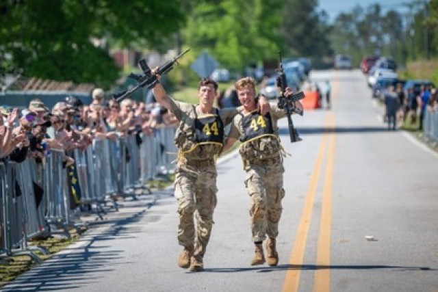 1st Lt. Griff Hokanson and 1st Lt. Kevin cross the finish line at the final buddy run event at the 2025 Best Ranger Competition April 13, 2025, at Camp Rogers, on Fort Benning, Georgia. (U.S. Army photo by Patrick A. Albright)