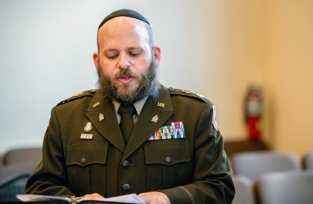 U.S. Army Chaplain Maj. Mendy Stern, Jewish Chaplain for JBSA and Brigade Chaplain, 103rd Signal Brigade, begins the awards ceremony for U.S. Army Air Corps 1st Lt. Gerald Teldon, retired, for his honorable service as a pilot on July 29, 2022, at...
