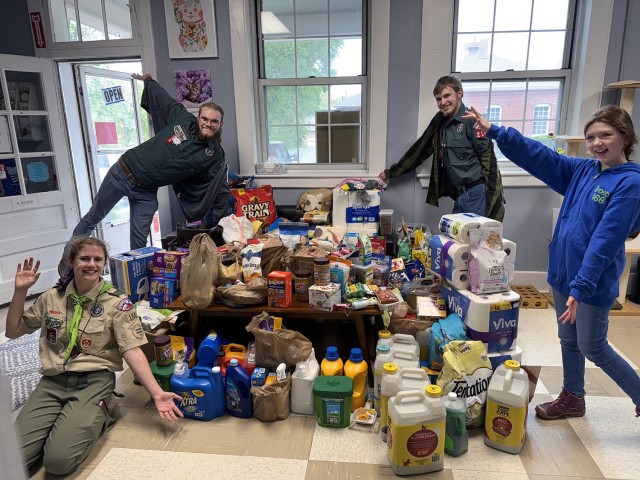 Leavenworth (Kansas) High School senior Elizabeth Faught, Scouting America Troop 166, bottom left, and friends Aidan Harris and Charlie Harris, Venture Crew 2165, and Mary Hausauer, also of Troop 166, drop off items — including paper towels,...