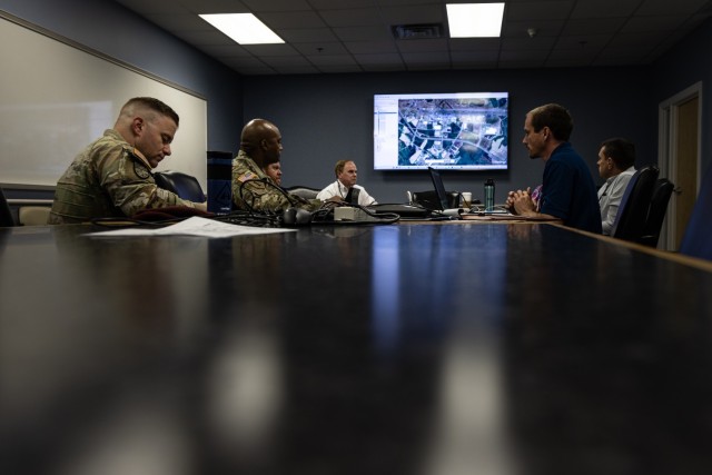 U.S. Army transportation planners from the XVIII Airborne Corps Transportation Office, FORSCOM Installation Deployment Support Team (iDST), and officials from North Carolina Global TransPark (GTP) discuss land capabilities in Kinston, N.C., April...