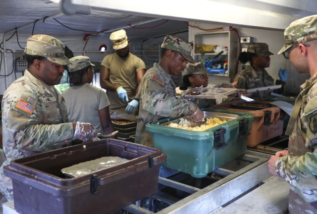 U.S Soldiers assigned to the 5001st Field Feeding Company, 167th Theater Sustainment Command, Alabama Army National Guard, serve breakfast to TRADEWINDS 25 (TW25) participants at Tetron Bay, Trinidad and Tobago, April 26, 2025. TW25 is a U.S....