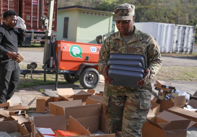 U.S. Army Staff Sgt Robriesha Moore-Jones, assigned to the 5001st Field Feeding Company, 167th Theater Sustainment Command, Alabama Army National Guard, begins preparation for dinner during TRADEWINDS 25 (TW25) at Tetron Bay, Trinidad and Tobago,...