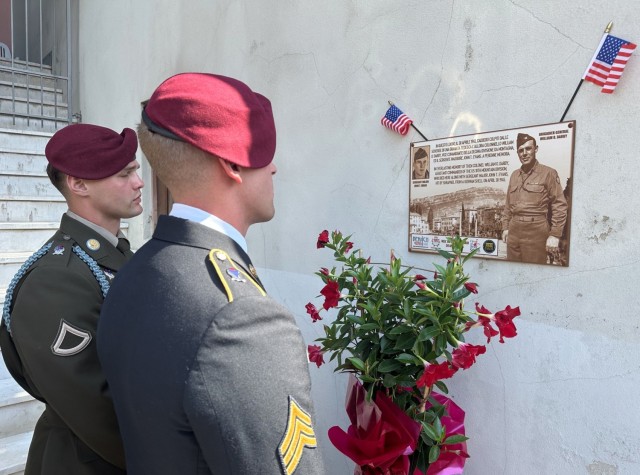 Pfc. Donovan Jourdan, 23, of Denver, Colorado and Sgt. Ivan Blanton, of the 173rd Airborne Brigade, 27, of Santa Fe, Texas, view the plaque at the spot where Col. William O. Darby and Sgt. Maj. John “Tim” Evans, were killed by a German shell...