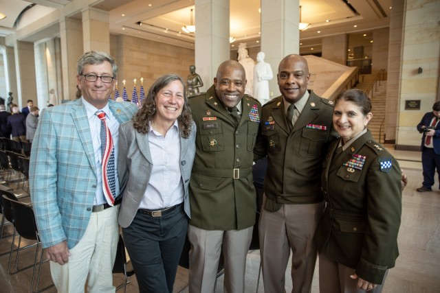 Retired Lt. Gen. Jody Daniels (second from left), former chief of the Army Reserve; Chief Warrant Officer 5 Lashon White, Army Reserve command chief warrant officer; Command Sgt. Maj. Gregory Betty, Army Reserve command sergeant major; and Maj....