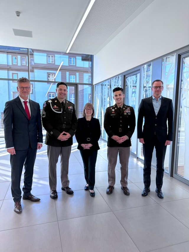 Barbara Bein [U.S. Consulate General Leipzig], CPT Diego Caula / SFC Henry Caldera [928TH CBN], and members of Suhl Chamber of Commerce